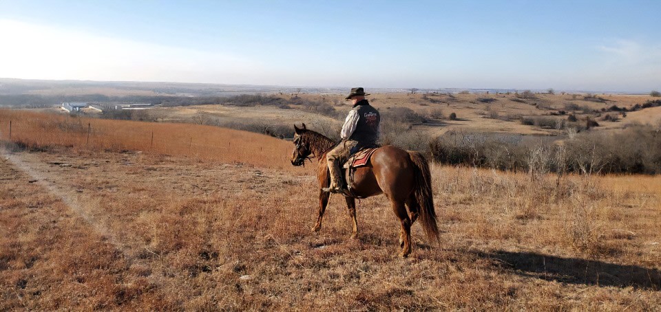 joe riding ranch view